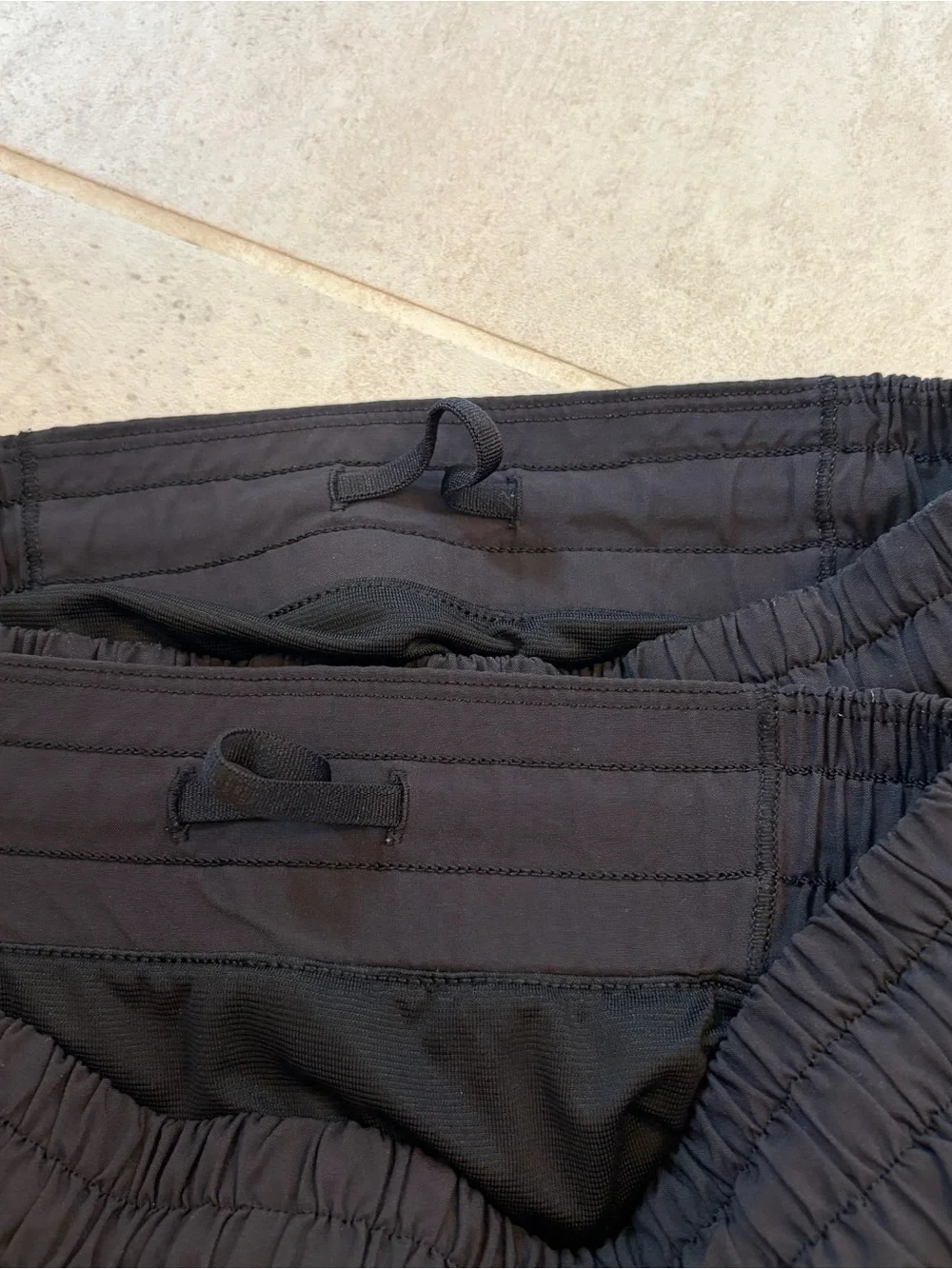 Lululemon Black Hotty Hot 4” low rise shorts — 2 PAIRS
